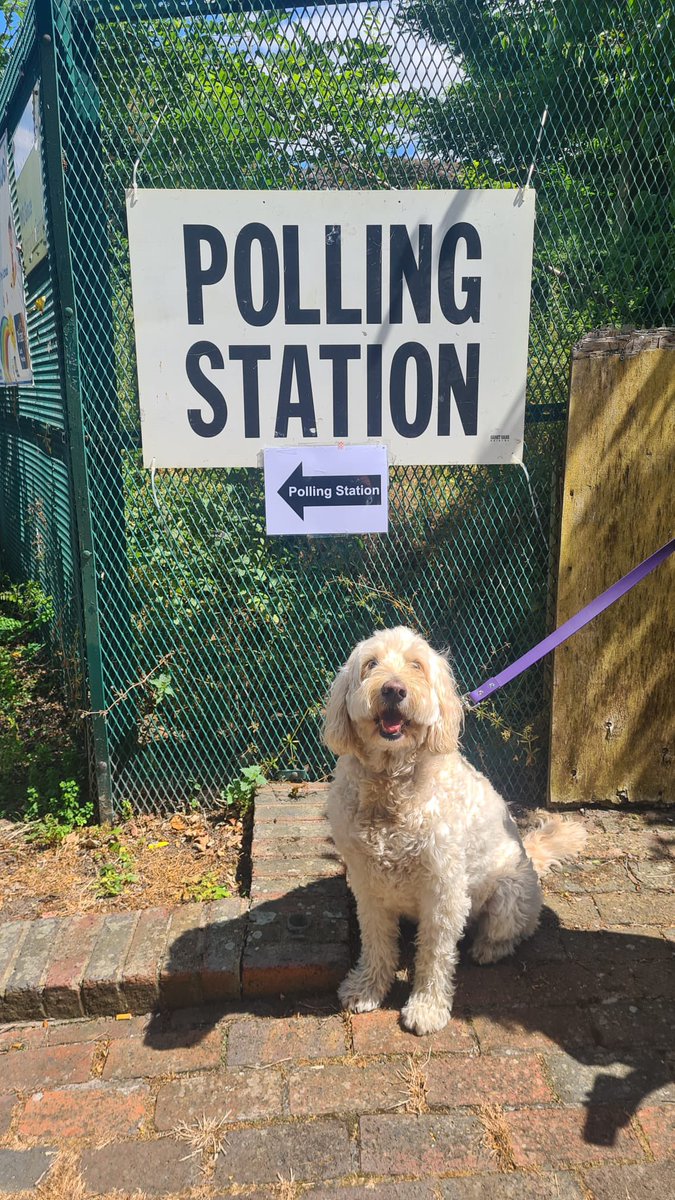 Of course she’s there, freshly voted #dogsatpollingstations