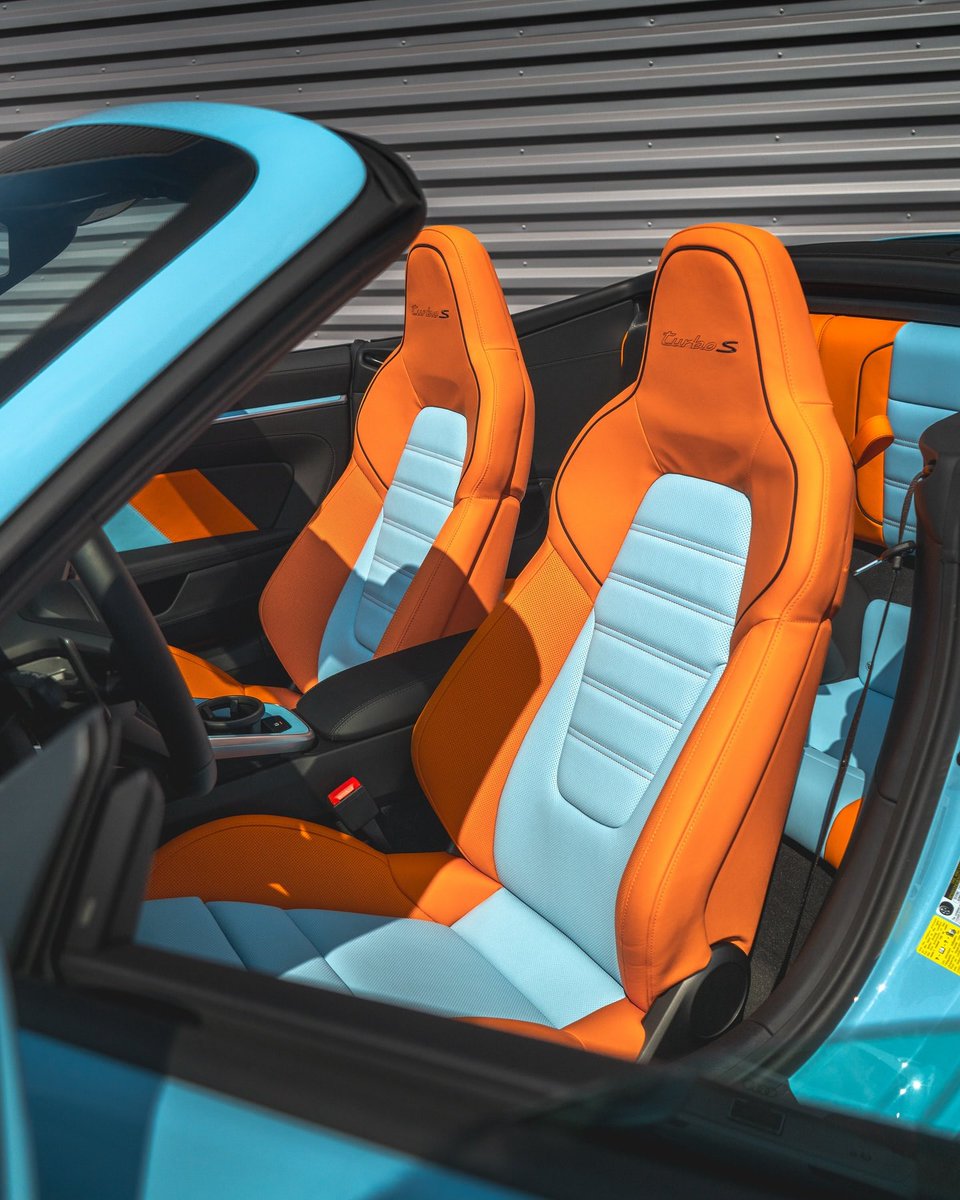 TailoredDriver's tweet photo. 2024 911 Turbo S Cabriolet in PTS Gulf Blue 328 over an LTS Interior in Gulf Blue/Gulf Orange. It features a special split design on the door cards as well as the Sonderwunsch door sills. https://t.co/XDTUqFUyB8