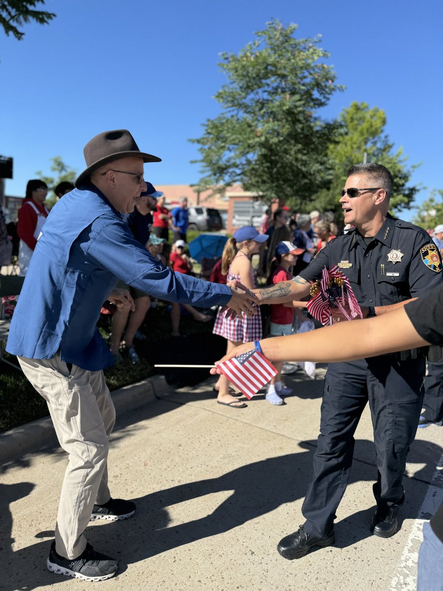 dcsheriff's tweet photo. We have the best community!! @SheriffWeekly and some of #DCSOs finest felt the love during today’s @HRCAnews and @highlands_ranch parade. What a beautiful day to celebrate our nation’s independence!! Have a safe and happy Fourth of July, we will be here if you need us. https://t.co/1zjKg6Fvxe