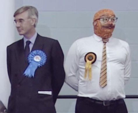 The photo of #JacobReesMogg losing his seat,  beside someone wearing a beans balaclava has to be hung in the Louvre #ElectionResults
