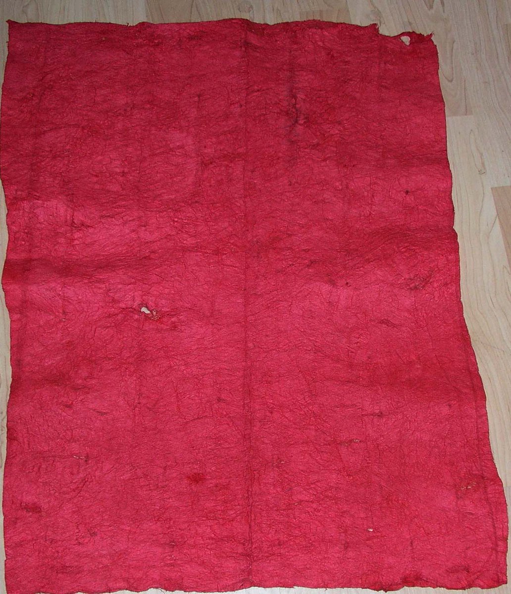 Some of our naturally hand dyed Tapa, (Scarlet) 24x36 or by the roll.