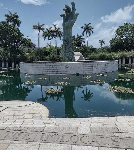 Designed by acclaimed sculptor Kenneth Treister, FAIA, <a href="/HolocaustMemMia/">HolocaustMemorialMB</a> is constructed of Jerusalem stone &amp; marble in a park-like setting meant for contemplation &amp; meditation.  Visitors may stroll through the various exhibits, guided by a mobile phone app available in 8 languages