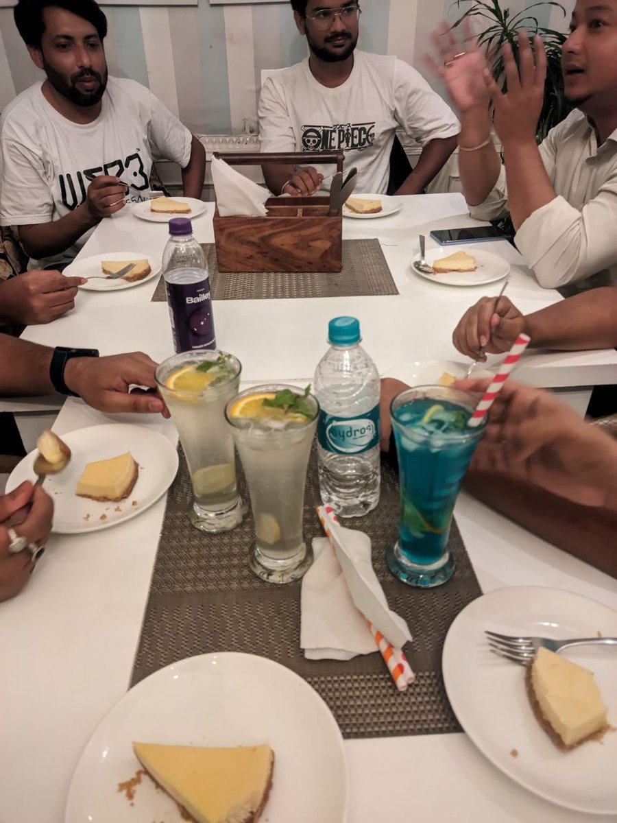 Web3Assam's tweet photo. Despite the city turning into a waterpark (thanks, rain!), a brave bunch of @solana maxis surfed their way to the meetup. 🏄‍♂️🌧️

🍝☕️🍹🥟🍔🍕🥧 and good times —because that’s how we roll! 🤪