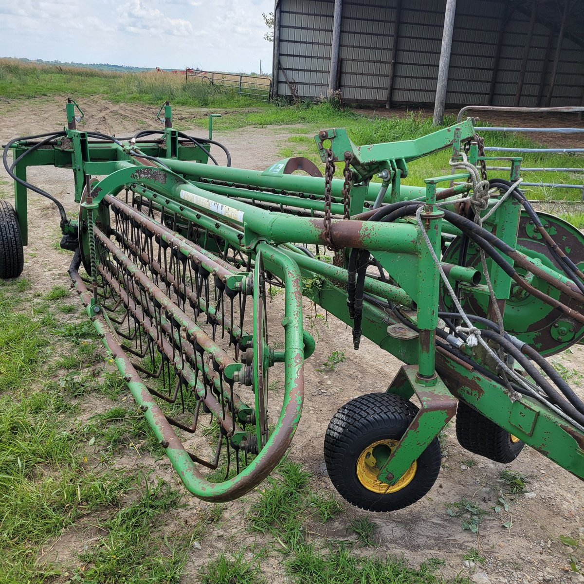 JD 700 rake for sale. $4,000.  It works fine. It's just that my 74 year old raker has trouble folding it, so I have to stop baling and help him move.