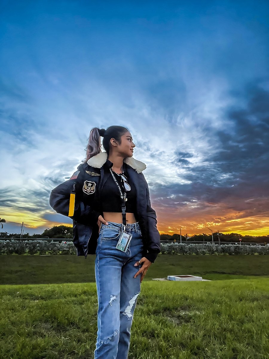 TopGunstore's tweet image. Sakhi embodying the spirit of adventure in our TOP GUN® "CORONADO" NYLON JACKET, against a backdrop of soaring planes. ✈️ Elevate your style with timeless aviation flair.

#TopGun #AviatorStyle #Fashion #OOTD  #ExplorePage #FashionInspiration #TheFlyingLegend