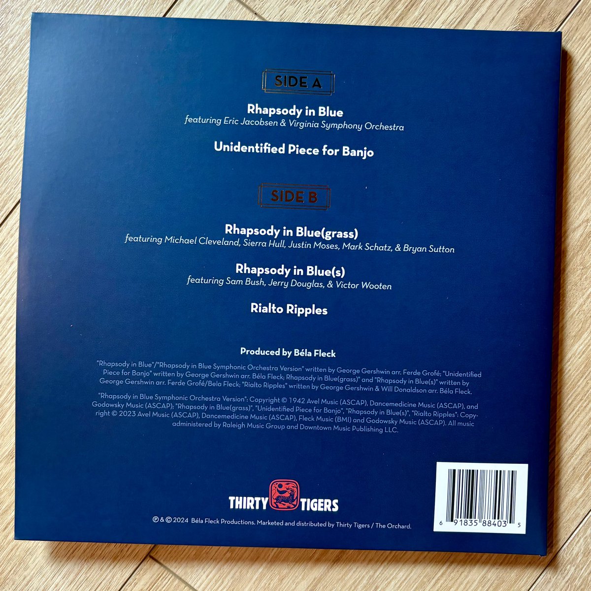CMoneyKS's tweet photo. Super excited to finally get this @belafleckbanjo #RhapsodyInBlue on the cool blue swirly blue vinyl, sounds amazing. #Gershwin #Banjo #RhapsodyInBluegrass #RhapsodyInBlues #Bluegrass #VirginiaSymphonyOrchestra @sierrahull @VictorWooten #SamBush https://t.co/vknAtmT6ky