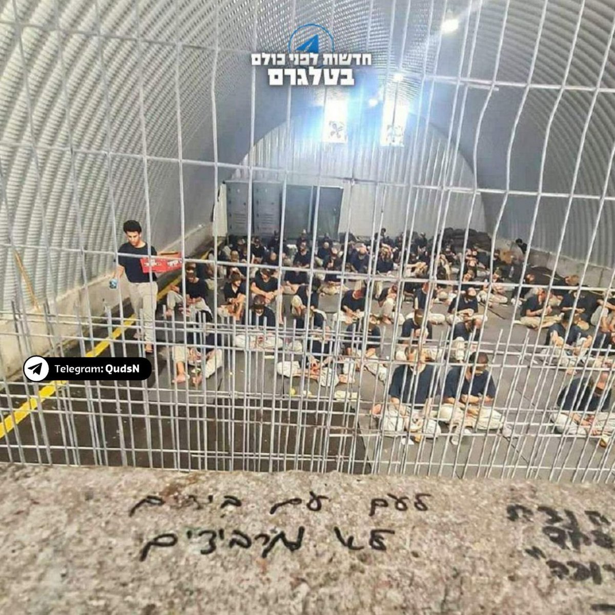 The air is filled with the "putrid stench" of "neglected wounds left to rot"

"The room hummed with the men’s murmurs" who get beaten up mercilessly if they dare to speak, move, or sleep

Blindfolded, handcuffed &amp; forced to sit in this position all day long for months

Israel's