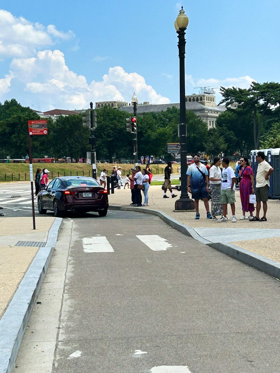 A maroon Nissan Altima was seen driving at speed down the protected bike lane of 15th St NW at Madison Dr. The submitting cyclist reports they had to scramble onto the curb to avoid being struck by the oncoming vehicle. We need better enforcement. <a href="/311DCgov/">DC311</a> #bikeDC #SafeStreets
