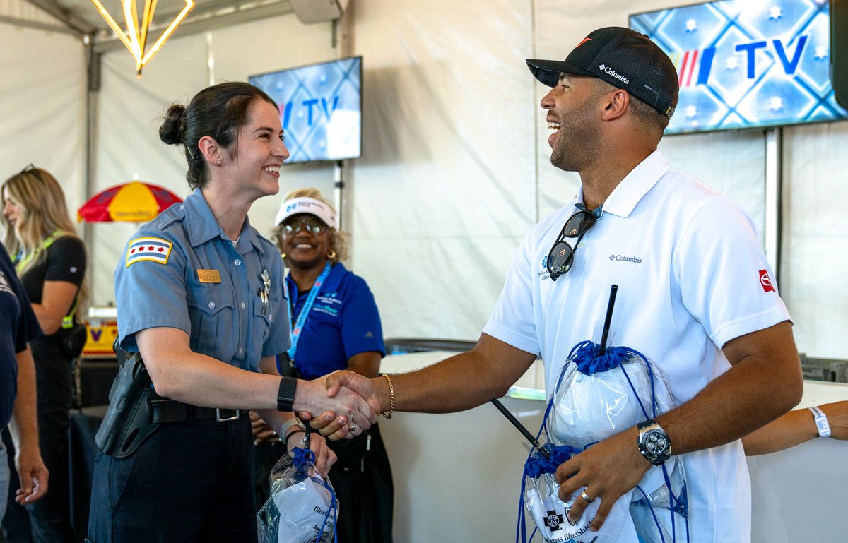 BCBSIL's tweet photo. We honored @CFDMedia @Chicago_Police & @StreetsandSan workers with the #HeroWalk with @NASCARChicago @BubbaWallace @23XIRacing. They got an inside look at the track before the big race. Thank you for keeping our community safe and strong. #NASCARChicago #DrivingAccess https://t.co/m9O96q2muf