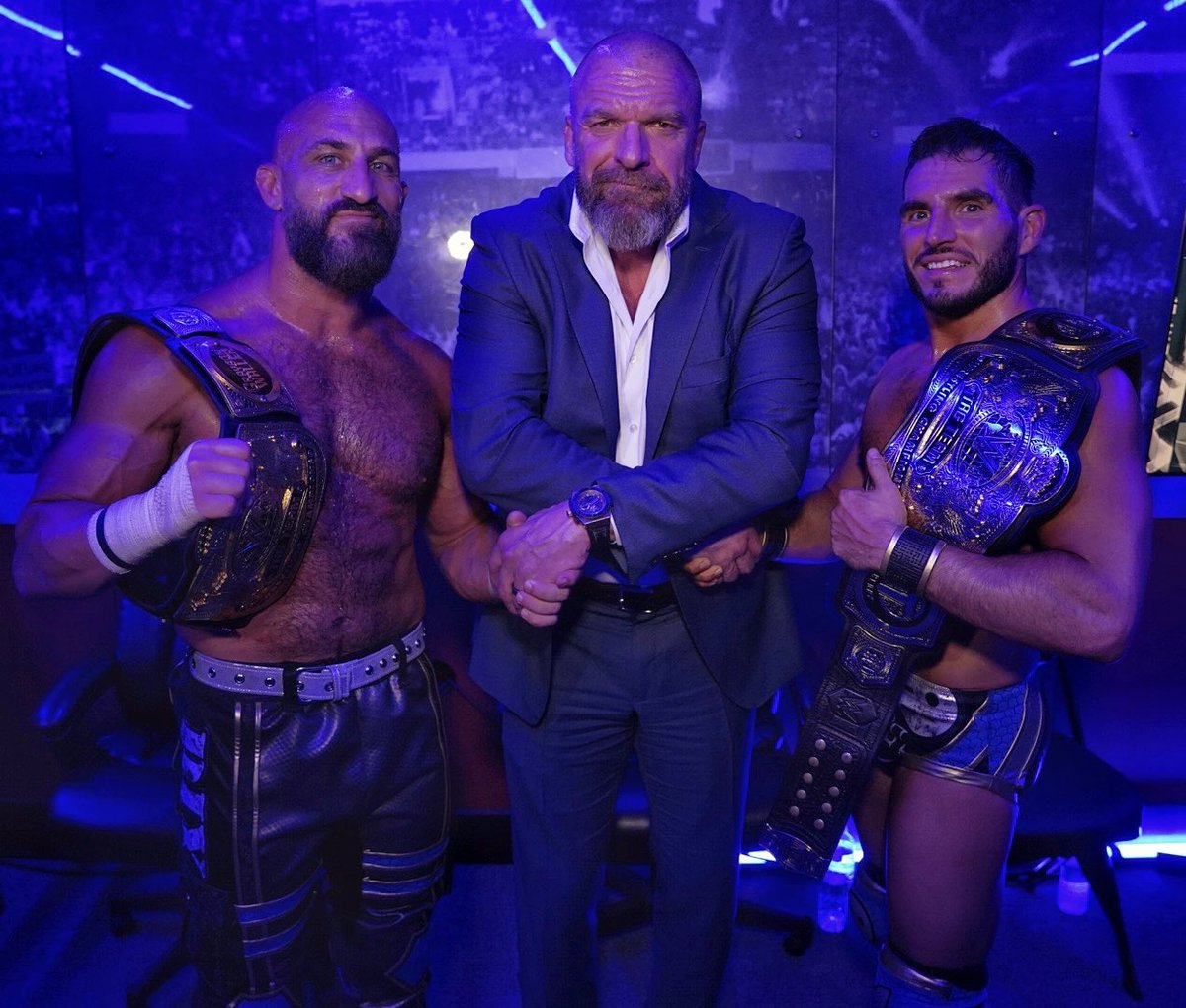 TripleH's tweet photo. So much history here. @JohnnyGargano &amp; @CiampaWWE stepped into the same building where they first won tag team gold… and did it all over again.

Congrats to #DIY, your NEW @WWE Tag Team Champions. #AndNew #SmackDown https://t.co/Lr5yo1A08l