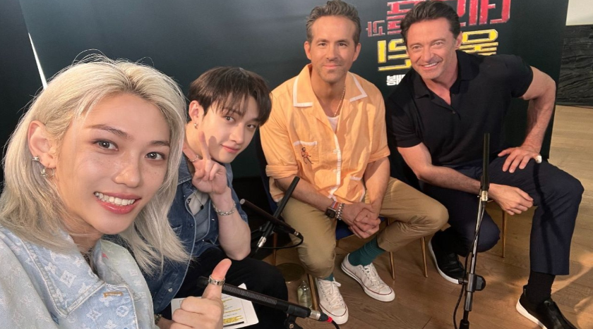 Stray Kids recently teased an exciting collaboration with Hollywood stars Ryan Reynolds and Hugh Jackman, known for their roles as Deadpool and Wolverine, respectively. In a surprise move, Stray Kids' Bangchan and Felix shared a photo on Instagram alongside Reynolds and Jackman,