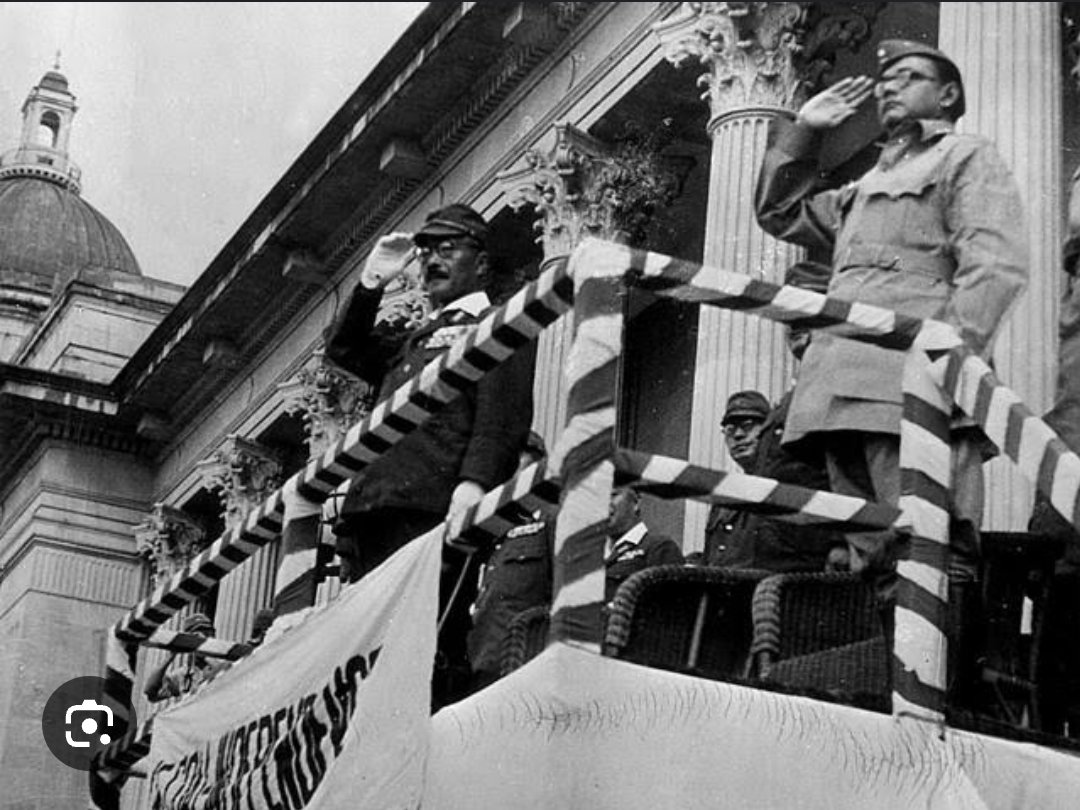 AmbalikaRayan's tweet photo. #NetajiWeek On 6th July, 1943 the Japanese premier and War Minister, General Hideki Tojo ( with white gloves on) along with Netaji Subhas Chandra Bose took the salute of the Azad Hind Fauj at the grounds of the Singapore Municipal Building. https://t.co/V6E2QlUcXD