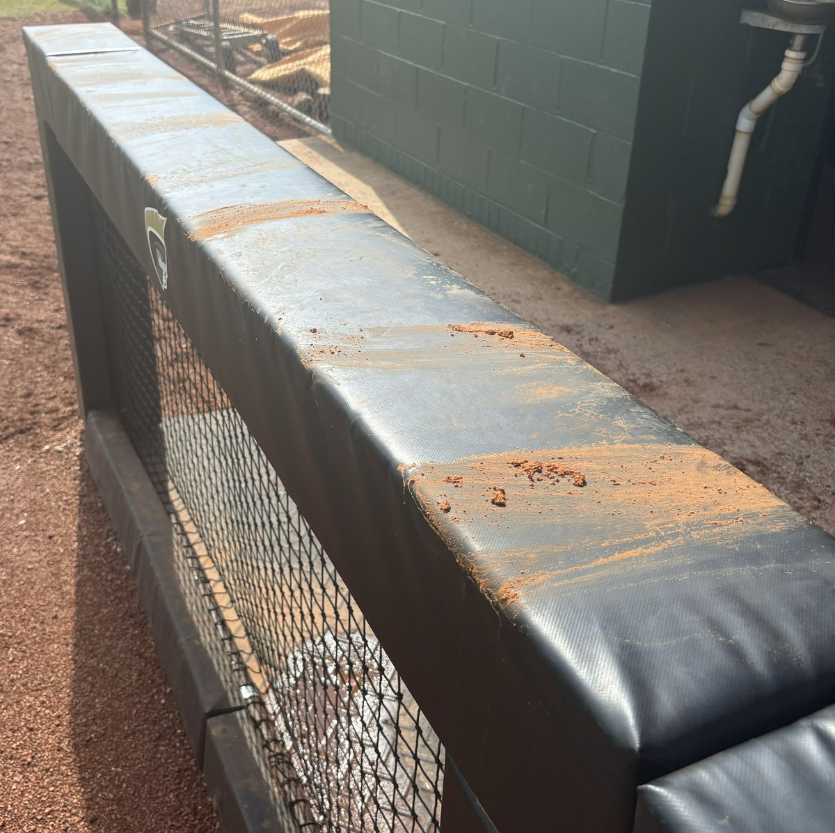 As a college coach, we’re getting more reluctant by the day to let travel ball teams play on our fields. I know field conditions this am were not the best after 1.5” of rain yesterday. No reason to use our padding to clean yourself off though. Bring a towel and a little respect😁