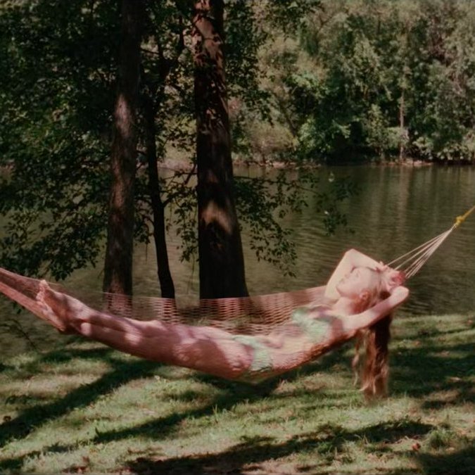 July 22: Main Character Lays on Hammock
#Bales2024FilmChallenge
#ISpitOnYourGrave (1978)
At the start of the movie, Jennifer Hills lays in a hammock and works on her novel. At the end, she lays in it as she awaits the opportunity to finish off her quartet of rapists.