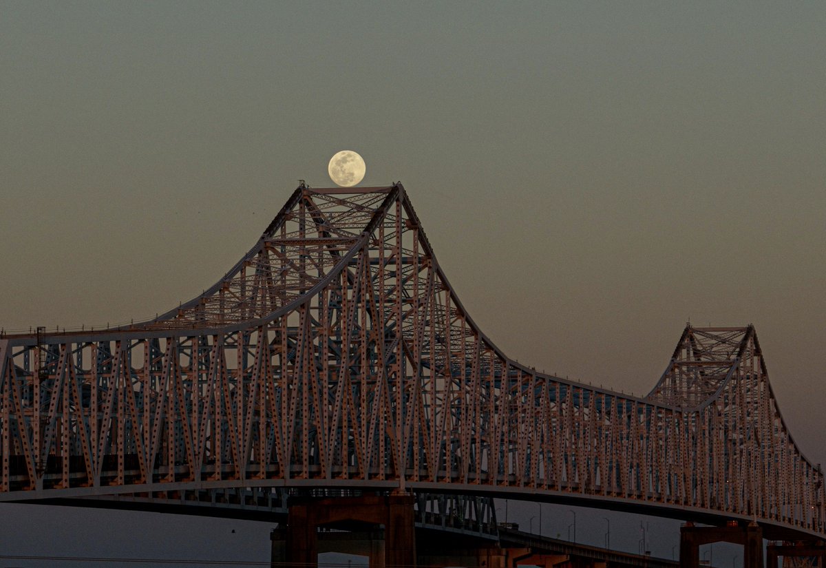 Moon resting on bridge, New Orleans