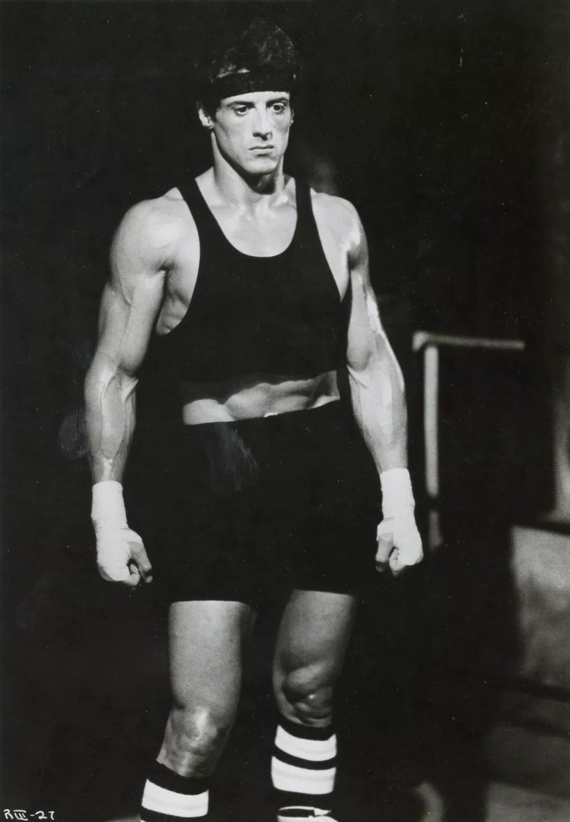we're in this weird moment were gender norms are being challenged, but also becoming more constricting. many men wore things in the past that would cause great panic today. John Wayne in tiny shorts in Acapulco (1959); Stallone in crop tops in the film Rocky. Both masculine icons