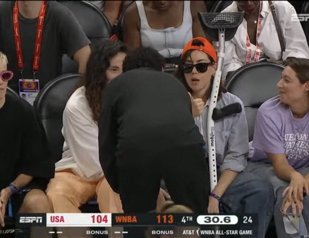 brilewerke's tweet photo. Aubrey Plaza giving the “I’m okay” thumbs up to Cheryl Miller after tearing her ACL playing a game of knockout at the new Mercury facility is truly the crossover I never knew I needed 😭😭 https://t.co/9oLBt0VpOX