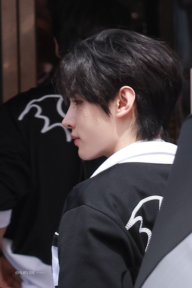 prodshn's tweet photo. sunghoon with wings and sticker beads under his eyes 🩶 https://t.co/tQo82u5rs5