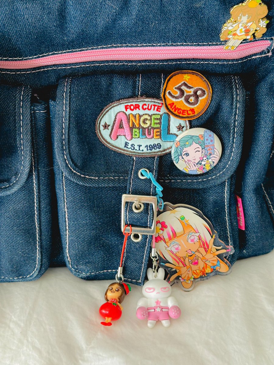 my trinkets bag 🍊✨