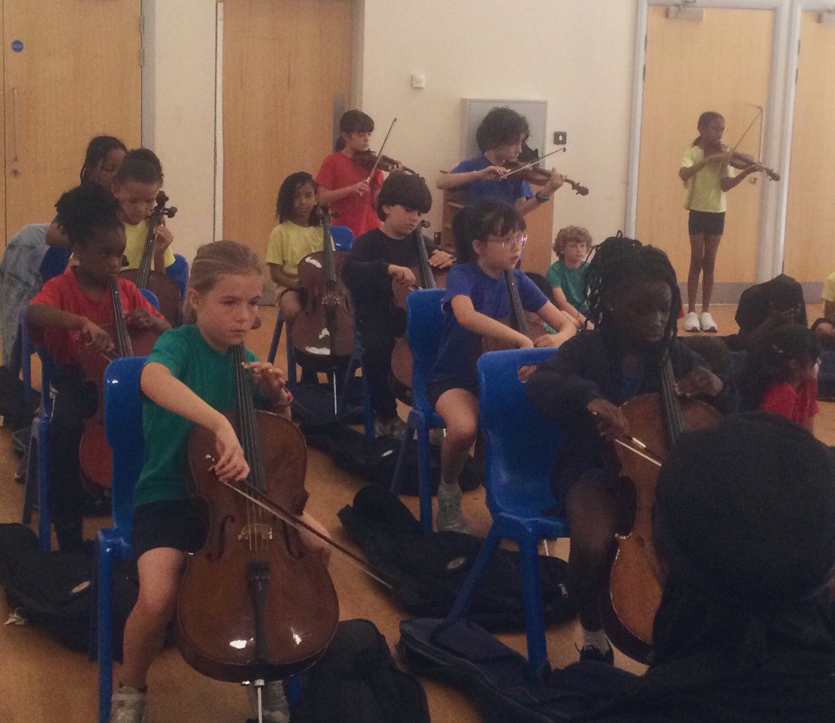 PrimaryWoody's tweet photo. We had a fun filled concert from 4B and 4OM on their violins and cellos this morning! We especially enjoyed the visit to space! Thanks @LambethMusic https://t.co/atwoqgE6EX