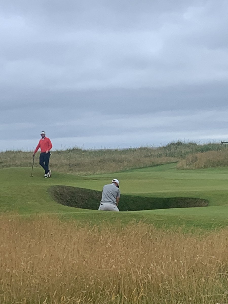 Johnson before failing to get out the bunker at the 2nd