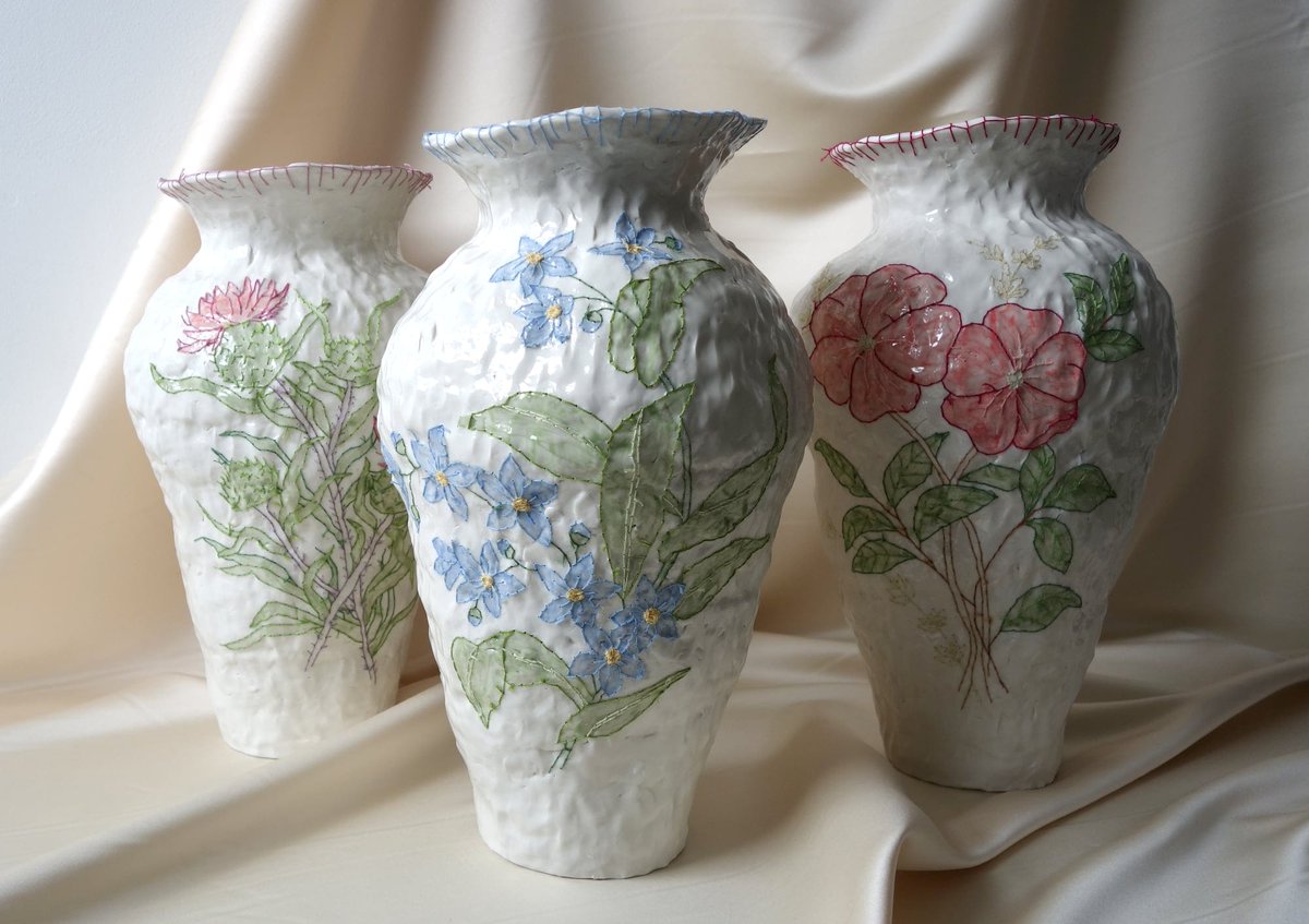 Check out Caroline Harrius and her stunning work  😍 She's taking embroidery to the next level by adding delicate floral patterns to ceramic vases 🌸 #EmbroideryArt #CeramicVases #FloralDesigns #UniqueArt