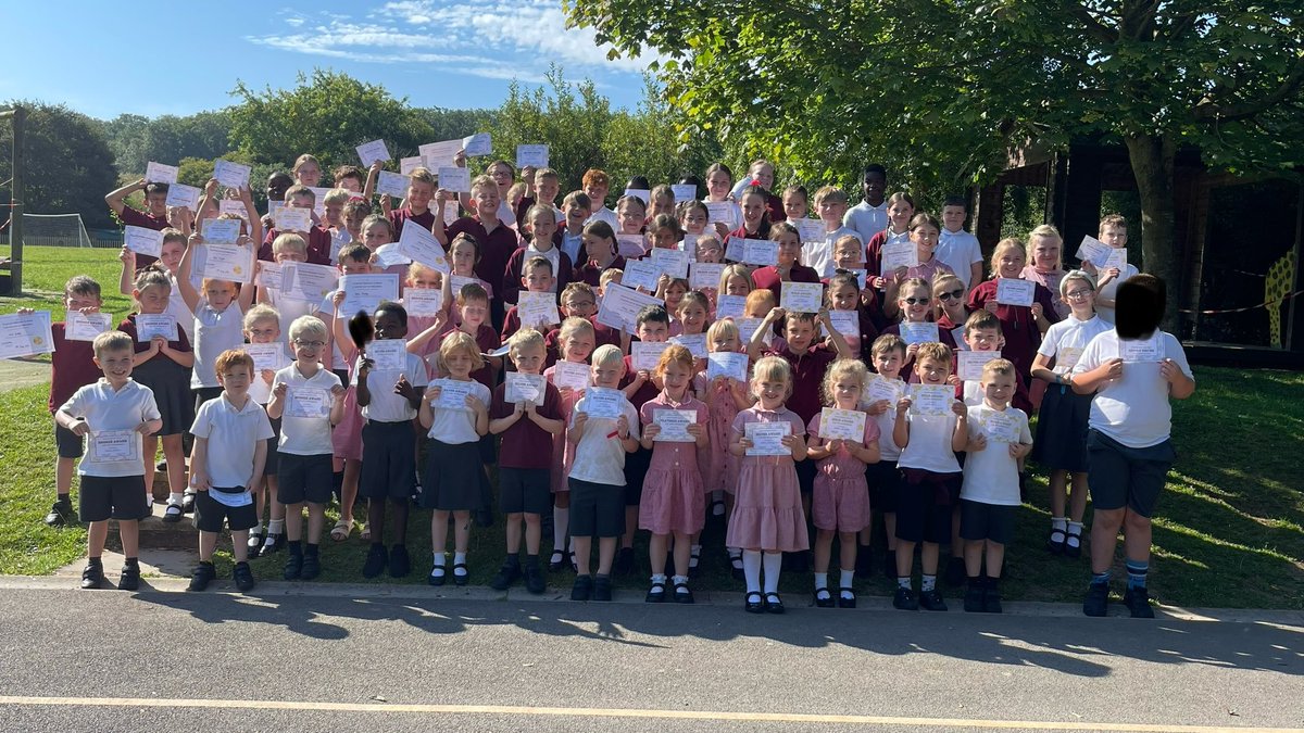 These children were given awards for good attendance. They all had above 97% for the year.