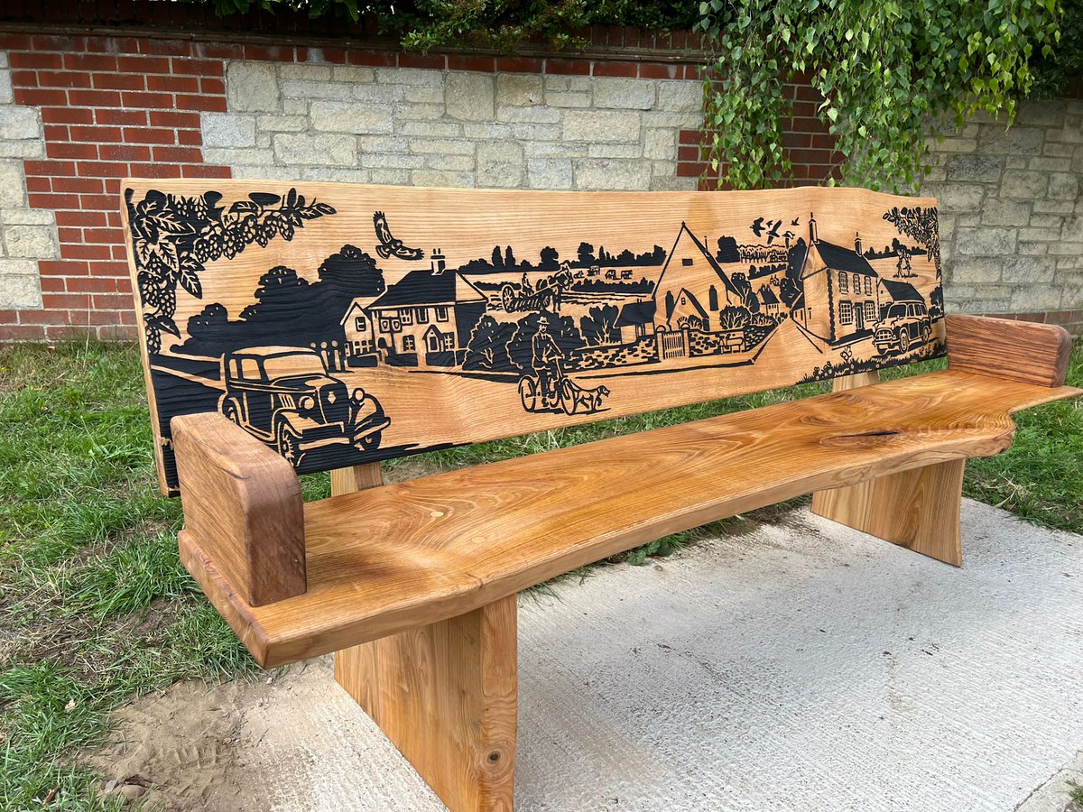GreenspacePegs's tweet photo. Kingston Bagpuize with Southmoor Parish Council have a new pair of etched benches with custom armrests. Each bench picks out local landmarks &amp; key features from the history of this picturesque village. Beautiful artwork by Mike Langman @clennonvalley  #Benches #oxfordshire https://t.co/cBsgYIhswB