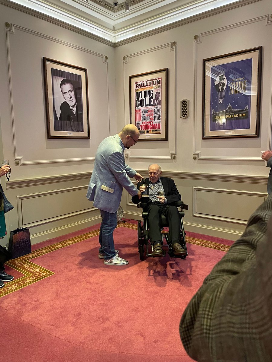 OlivierAwards's tweet photo. Ahead of @hellodollyLDN's opening night, Edwin Shaw received an honorary Olivier Award to celebrate his amazing 60+ year career within the industry, with 22 of those as Box Office Manager at the @LondonPalladium. 
A huge congratulations to Edwin for his dedication to theatre. https://t.co/MXSsgX3yVN