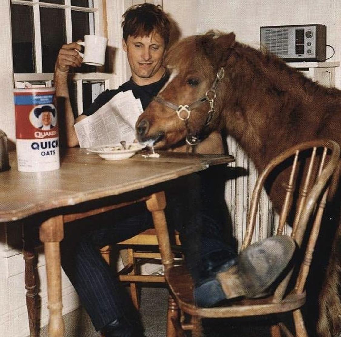 DannyDrinksWine's tweet photo. Viggo Mortensen having breakfast with a pony. https://t.co/x2gde3DVs8