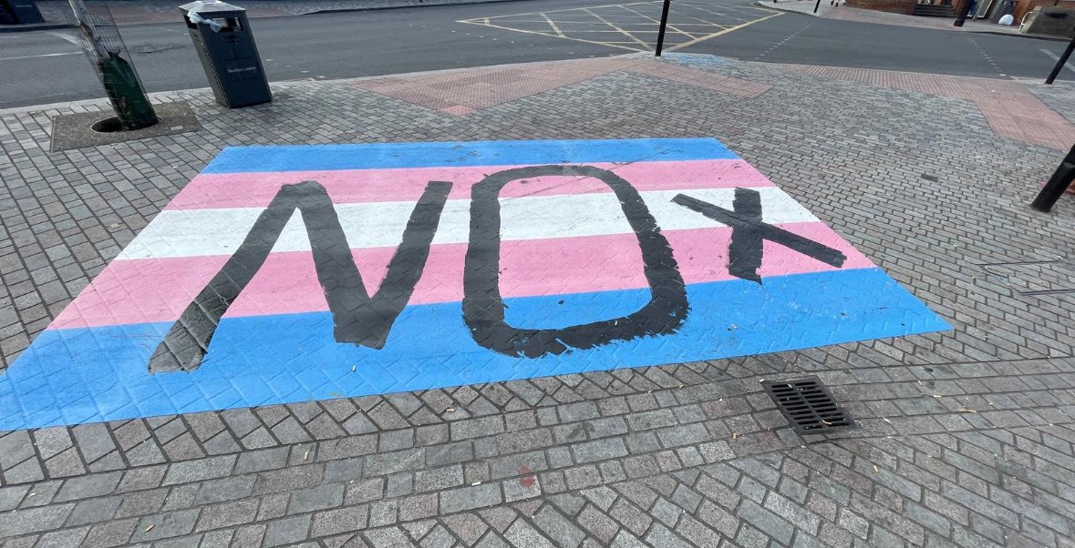 Uma_Kumaran's tweet photo. I’m sorry to share these images. Sadly, once again, the flags in Forest Gate have been defaced.

I will do everything in my power to tackle LGBT+ hate crime.

I know the fear and hurt this causes. 

I’ll work with Newham Council, local police &amp; the Minister for equalities on this https://t.co/8zDzDYXee8