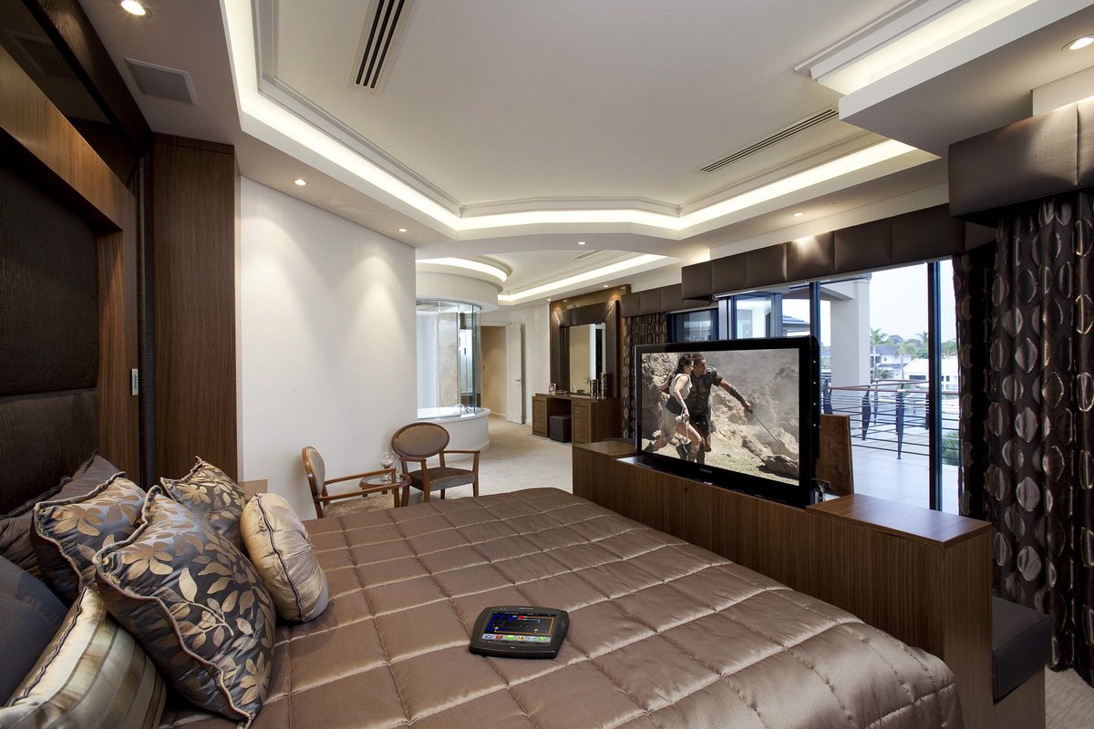 PHA2014's tweet photo. What do you think about this hidden cabinet mechanism for a tv? #hiddentv #luxury #bedroom #interiordesign #colorcoordinated https://t.co/EIajElrHhu