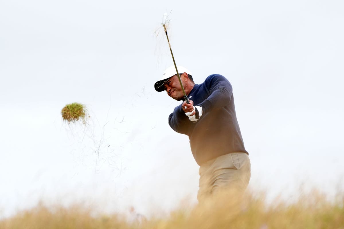Tiger Woods set to miss cut at the Open as Shane Lowry continues eventful charge dlvr.it/T9pXQG