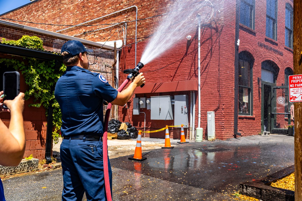 CityofGreer's tweet photo. A few weeks ago, @greerfire made it rain on a movie set! (And no, not that kind of make it rain.) The film crew for the upcoming movie @brotherstwice needed rain for a scene that they were filming here in downtown Greer and the Fire Department delivered. Enjoy this sneak peek! https://t.co/uHJFmN7t76