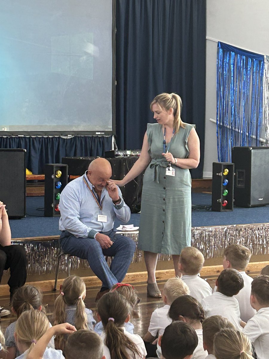 RichmondHillPA's tweet photo. A fabulous leaving assembly for Mr Norton who retires today 💙 Y6 pupils shared memories, sang his favourite songs’ Our school Anthem sang by @TheJaneMcDonald was sung by all our children with a surprise - as we couldn’t get the real thing our children stepped 400 Jane’s 💙 https://t.co/zblv15PEzN