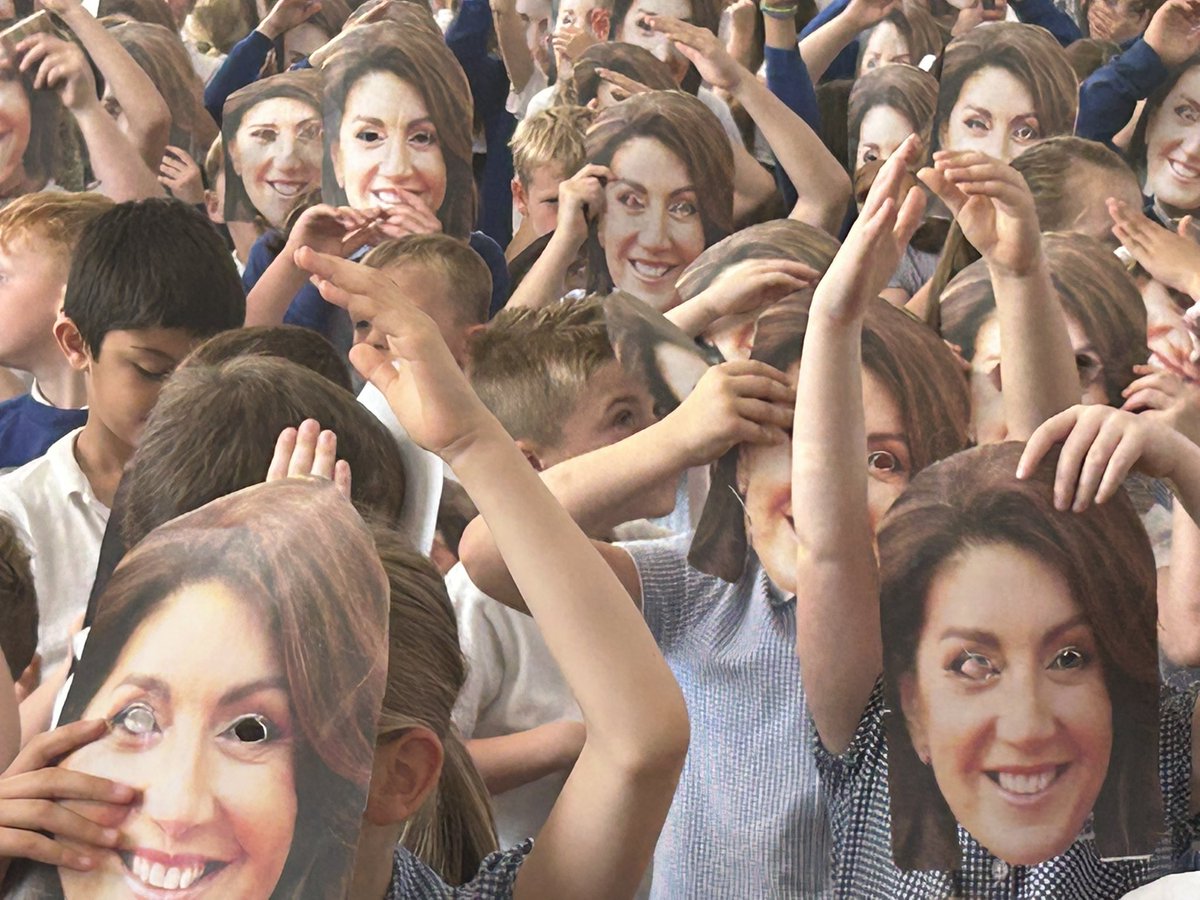 RichmondHillPA's tweet photo. A fabulous leaving assembly for Mr Norton who retires today 💙 Y6 pupils shared memories, sang his favourite songs’ Our school Anthem sang by @TheJaneMcDonald was sung by all our children with a surprise - as we couldn’t get the real thing our children stepped 400 Jane’s 💙 https://t.co/zblv15PEzN