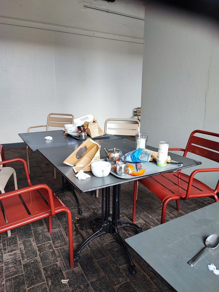 Trash left by the previous group. I wish it were possible to see cultural change such that this type of thing never happens. In Japan and you'd never see this, not even in McDonalds. UK is full of bellends raised/raising bellends. If you leave your trash like this your a bellend.