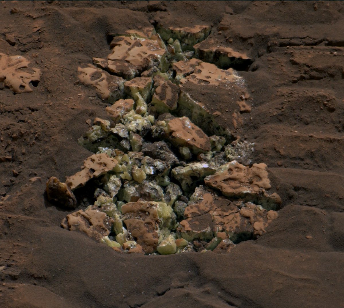 NASA (@nasa) on Twitter photo For the first time, our <a href="/MarsCuriosity/">Curiosity Rover</a> rover has found crystals of pure sulfur on the Red Planet—after rolling over a rock and cracking it open: go.nasa.gov/4bLGG1v For the first time, our <a href="/MarsCuriosity/">Curiosity Rover</a> rover has found crystals of pure sulfur on the Red Planet—after rolling over a rock and cracking it open: go.nasa.gov/4bLGG1v