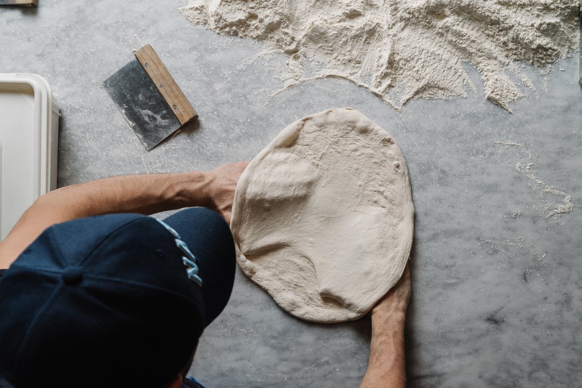 The base of any great Neapolitan pie lies within the dough. That’s why we make ours with 4 simple, high-quality ingredients – fresh yeast, 00 flour, water, and fine sea salt – to create the perfect Neapolitan pizza dough each time.