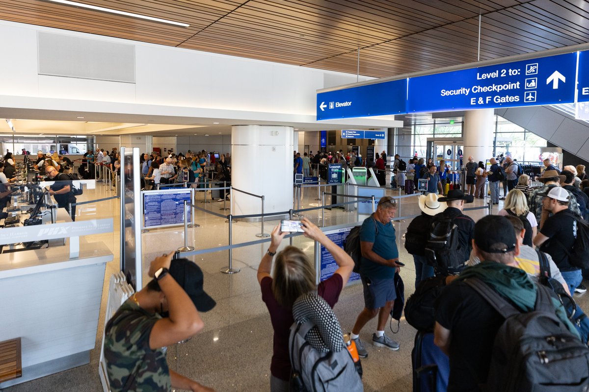 Travelers wait at Phoenix Sky Harbor for flights after a system outage led to global delays and cancellations on July 19, 2024 in Phoenix. 

For <a href="/azcentral/">azcentral</a>