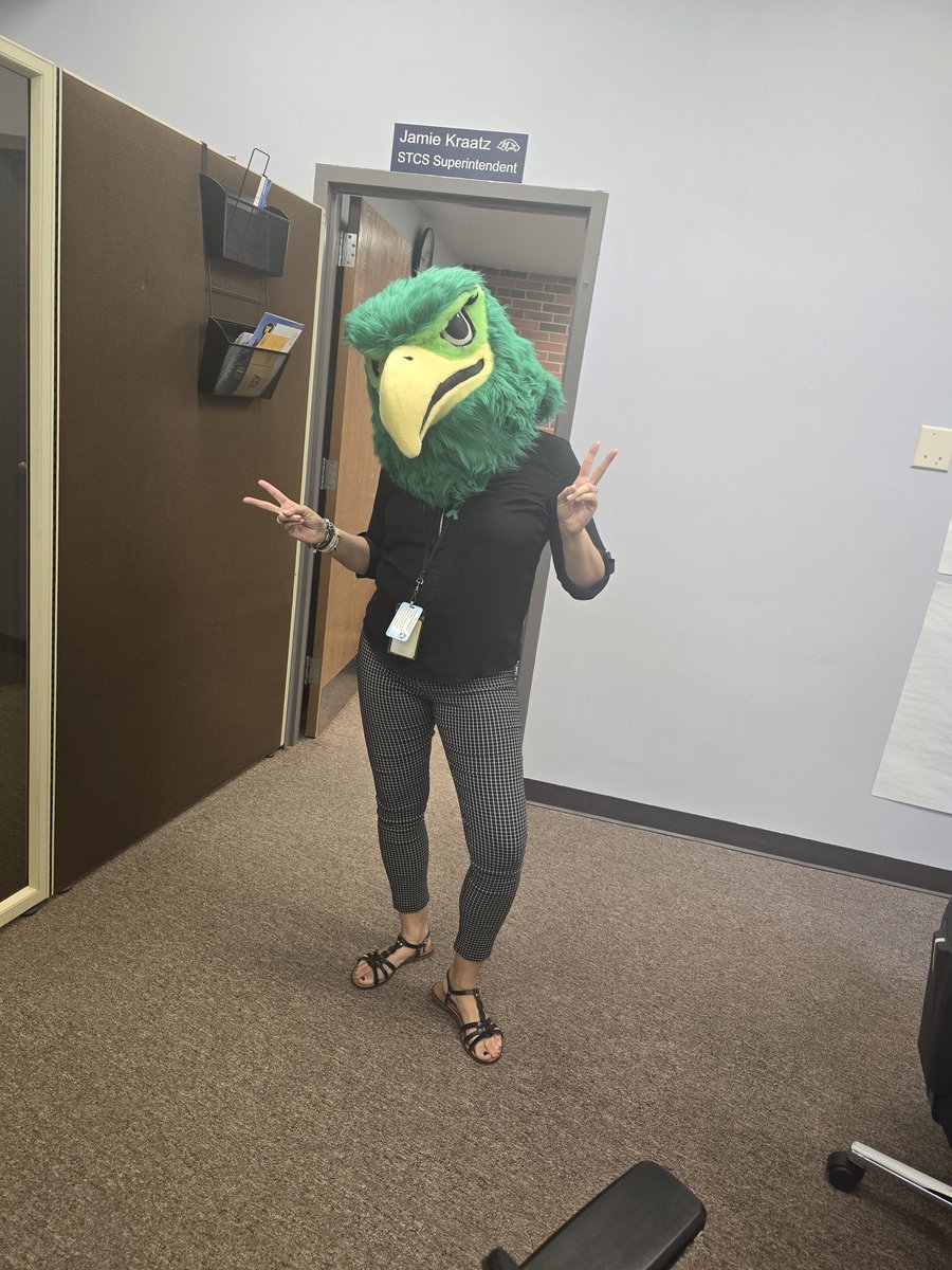 JamieKraatz's tweet photo. When the high school gets a new Hawk mascot costume, what's a superintendent to do? Try on the Hawk head, obviously! Isn't that what everyone does?? #GoHawks #STCSPride #schoolspirit #newmascot https://t.co/VVg1Dl2Zvu