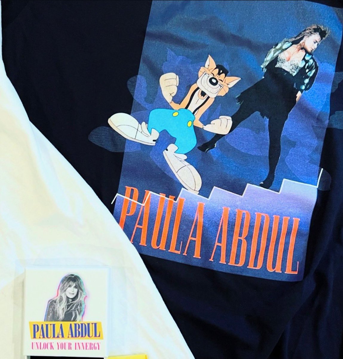 PaulaAbdul's tweet image. I can’t believe we’re already halfway through the #MagicSummerTour! Who’s been out to a show so far? If you haven’t yet, here’s a peek at my new merch tees and the goodies you get with my VIP package 🤭✨ For more details and to secure your VIP package, visit…