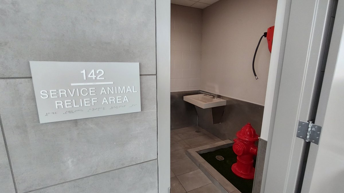 FlyMCW's tweet image. With a little help from our furry friends Bentley and Joya, here is another exciting addition in our new Terminal Facility, a Service Animal Relief Area that we have taken to calling SARA!