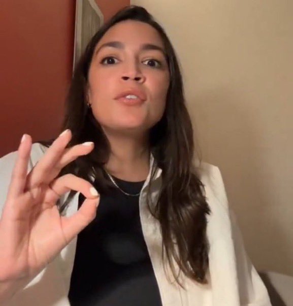 dom_lucre's tweet photo. 🔥🚨BREAKING: Rep. AOC was caught making the “White Power” hand sign during her rant on TikTok. It is worth noting that liberals created this narrative in 2016. https://t.co/wbfOPJOZHM