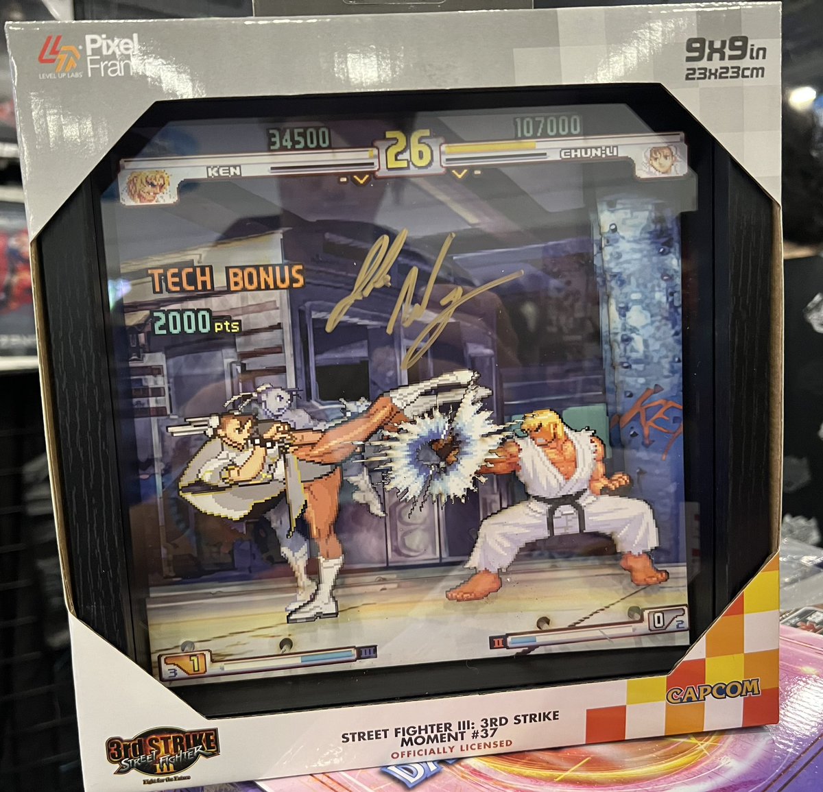 GamingGen's tweet photo. We have a limited amount of Moment #37 Pixel Frames at our booth signed by the one and only @JWonggg! Plenty of other frames are available as well!! @ThePixelFrames #EVO2024 https://t.co/Qc4qilKvXz