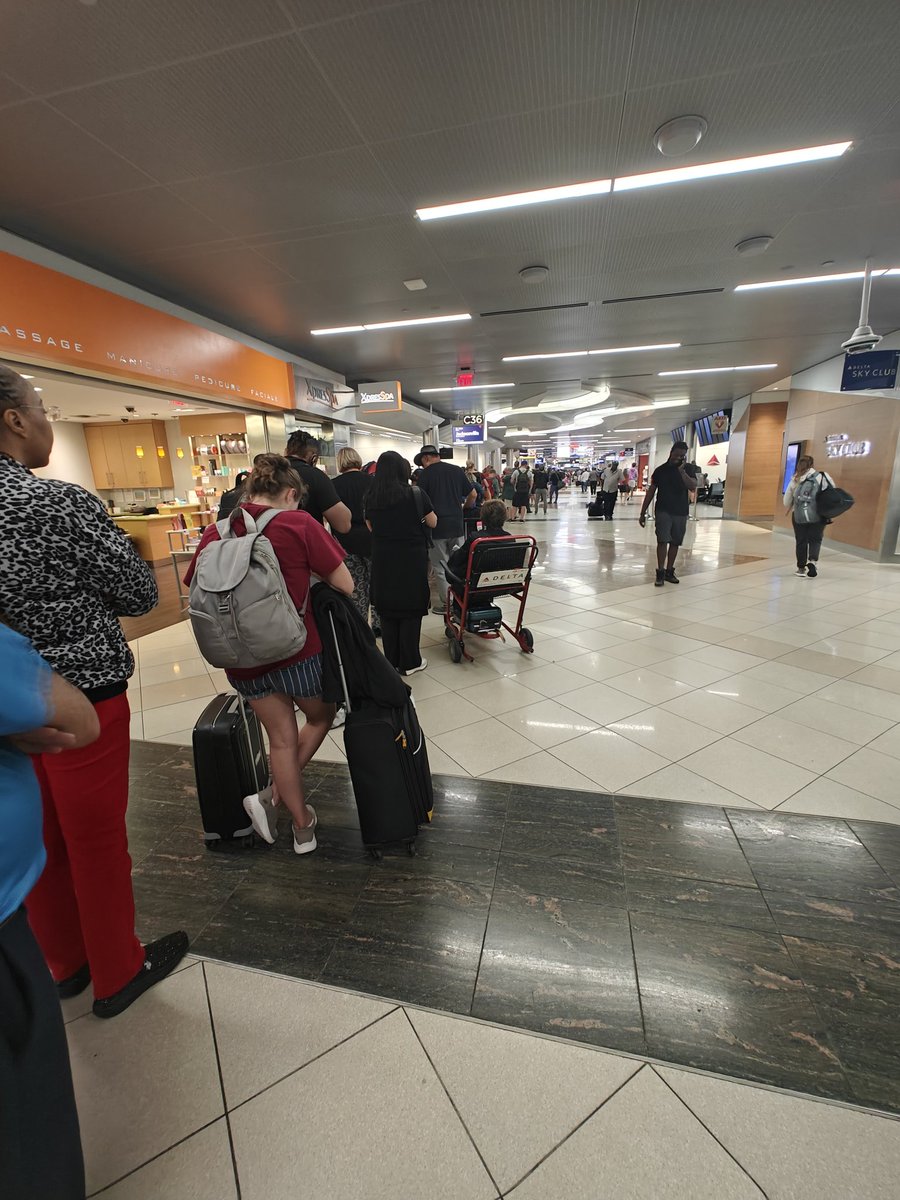 angelrobots's tweet photo. @Delta's customer service line is 4 or 5h long in ATL. 3 people working at the desk. App and website not working and over 2h waiting on the phone. A lot of people can take flights tomorrow, but we need somewhere to stay. Terrible response to this situation! https://t.co/jV7NeOYcgD