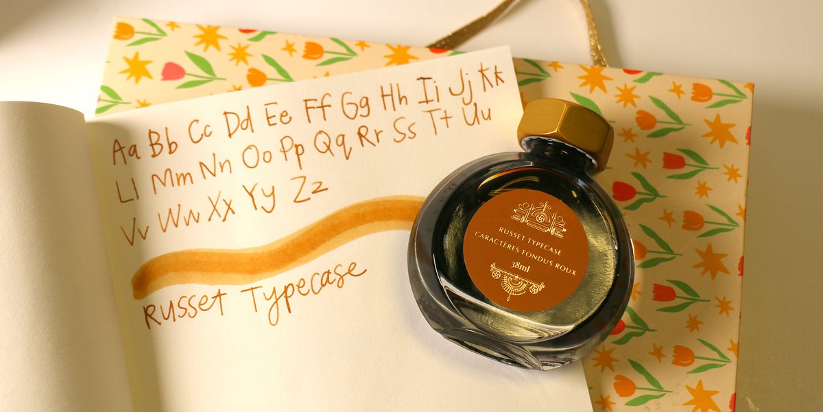 PenChalet's tweet photo. All you Ferris Wheel Press ink lovers, listen up! We have another ink that you can preorder TODAY - the Russet Typecase ink!๐งก This ink will inspire your next artistic endeavor: https://t.co/jc1gcS8dpP #FerrisWheelPressInks #FountainPenInks #InkSwatch #WritingSample #Inks https://t.co/hJe9woVSXx