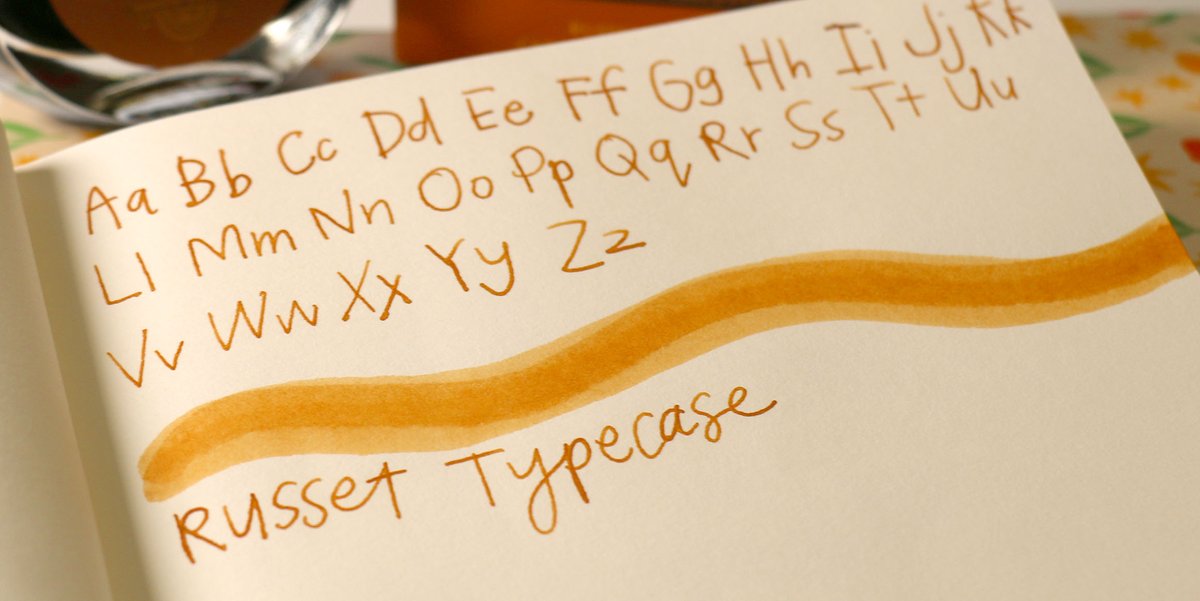 PenChalet's tweet photo. All you Ferris Wheel Press ink lovers, listen up! We have another ink that you can preorder TODAY - the Russet Typecase ink!๐งก This ink will inspire your next artistic endeavor: https://t.co/jc1gcS8dpP #FerrisWheelPressInks #FountainPenInks #InkSwatch #WritingSample #Inks https://t.co/hJe9woVSXx