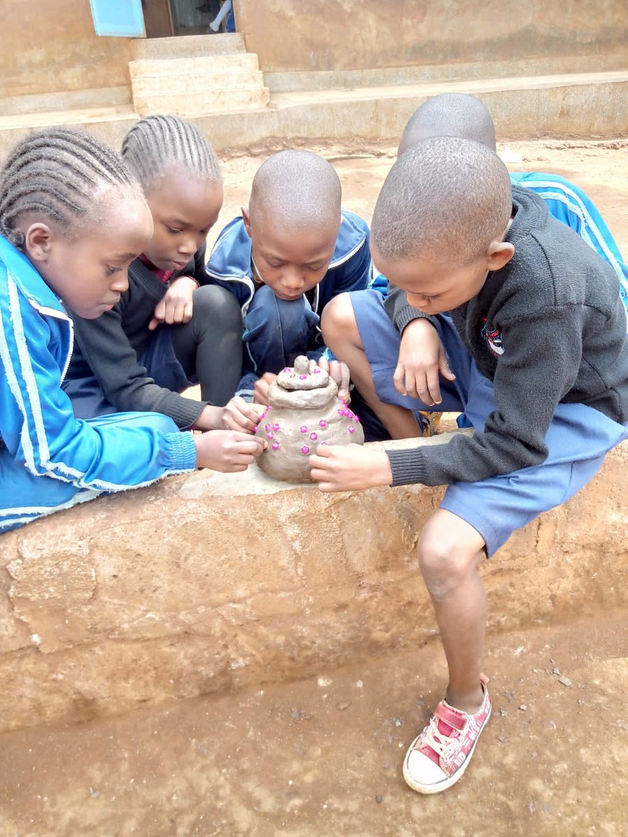 Pupils at Stara Rescue Center engaged in a CBC Project on moulding and decoration ⚱️.