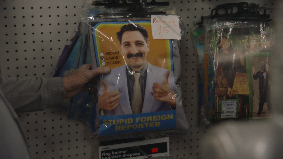 ultraflamz's tweet photo. @BootlegItems This immediately reminded me of Stupid Foreign Reporter from Borat 2 https://t.co/4x40q5YOUz